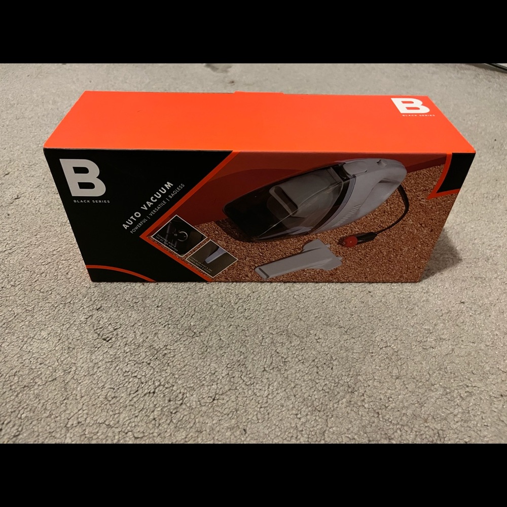 New in box auto vacuum